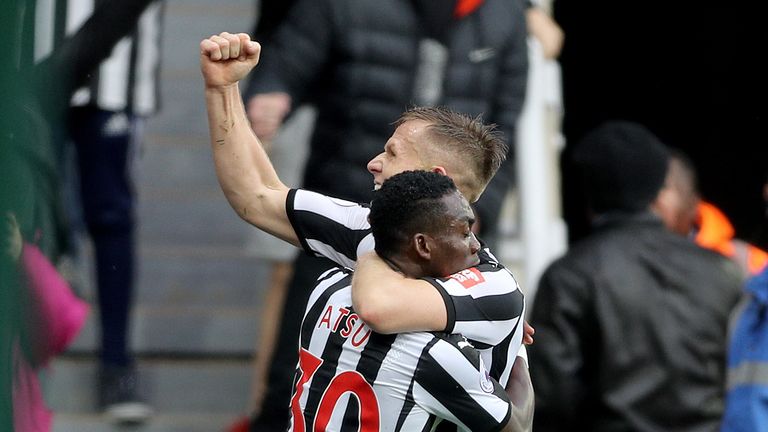Christian Atsu (left) celebrates with team-mate Matt Ritchie after scoring the opening goal
