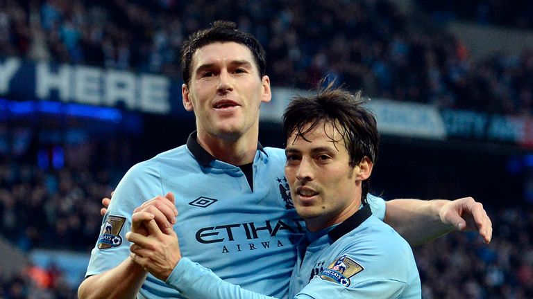 Barry (left) won the league with Manchester City in 2012