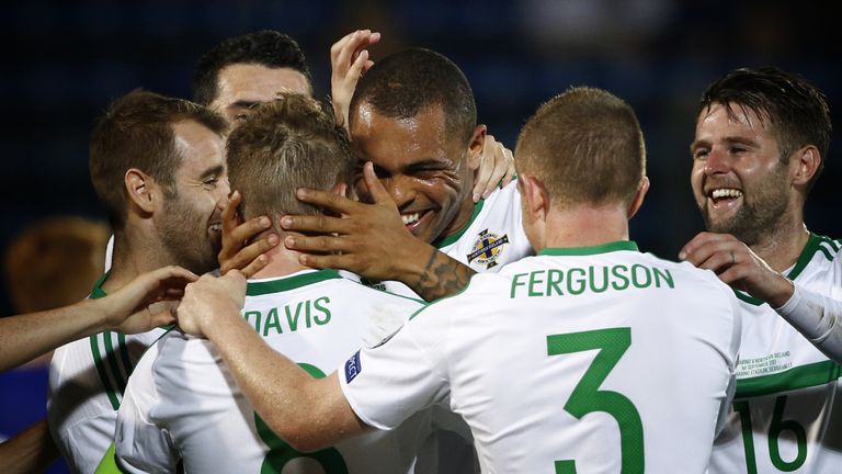 Northern Ireland beat San Marino 3-0 on Friday to close in on a World Cup play-off place