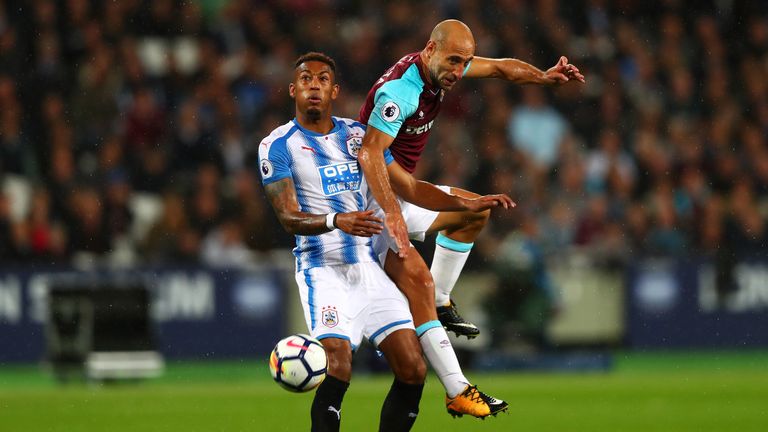 West Ham's Pablo Zabaleta and Rajiv van La Parra of Huddersfield battle for the ball