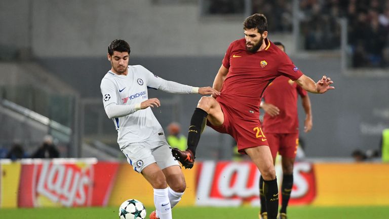 Alvaro Morata challenges Federico Fazio in the first half