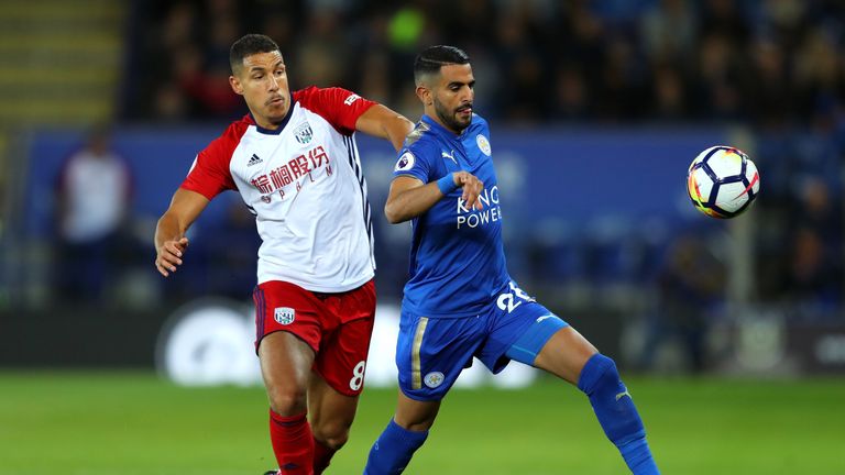 Riyad Mahrez (R) missed a glorious chance before Nacer Chadli's opener