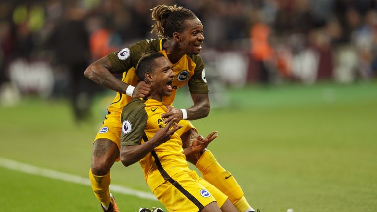 Brighton's Jose Izquierdo (front) is congratulated by team-mate Gaetan Bong after netting the second goal