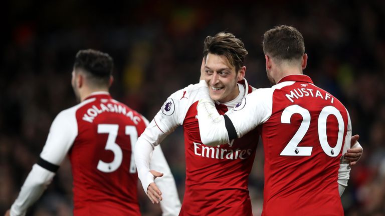 Mesut Ozil scored Arsenal's fourth goal against Huddersfield