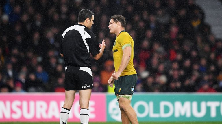 Australia captain Michael Hooper speaks to referee Ben O'Keeffe at Twickenham