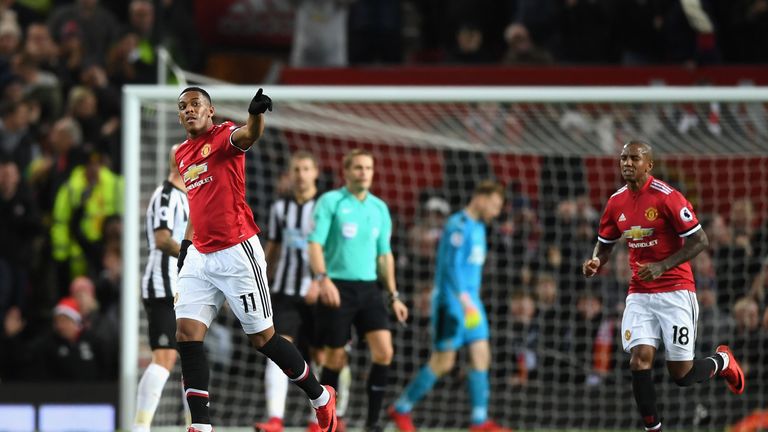 Anthony Martial celebrates his 37th-minute equaliser