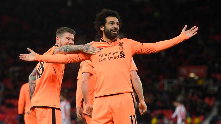 Mohamed Salah celebrates his second and Liverpool's third goal