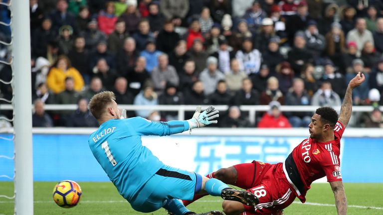 Andre Gray scores Watford's third goal of the game