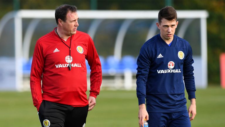 Malky Mackay (left) called a number of new faces into the Scotland squad including Rangers' Ryan Jack (right)