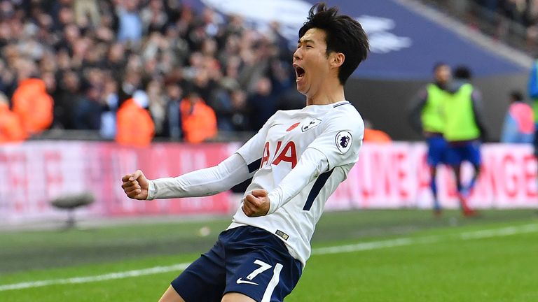Tottenham Hotspur's South Korean striker Son Heung-Min  celebrates scoring the opening goal during the English Premier League football match between Totten
