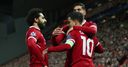 Reds run riot to secure top spot