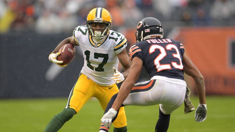 Fuller prepares to tackle Davante Adams of the Green Bay Packers