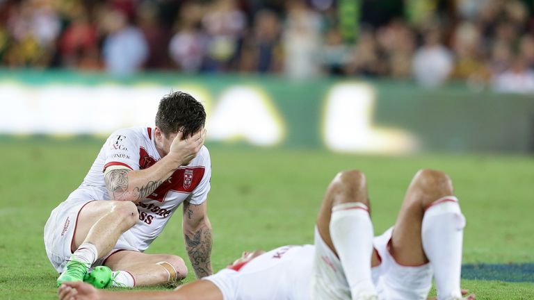England players show their devastation after losing the final to Australia
