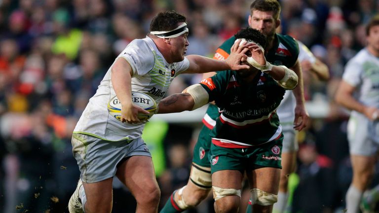Jamie George hands off Valentino Mapapalangi and runs in to score a try