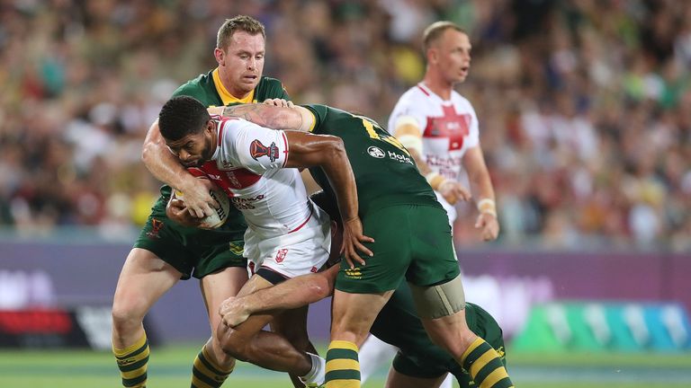 Kallum Watkins takes on Australia's defence