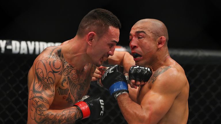 Max Holloway (L) has twice inflicted defeat on Jose Aldo