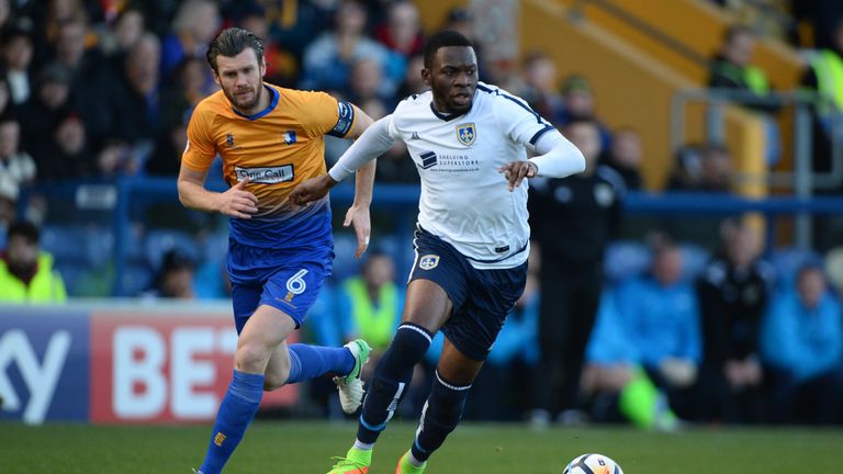 Mike Fondop-Talom of Guiseley in action against Mansfield