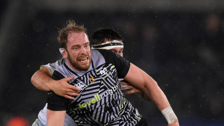 Alun Wyn Jones offloads in the tackle