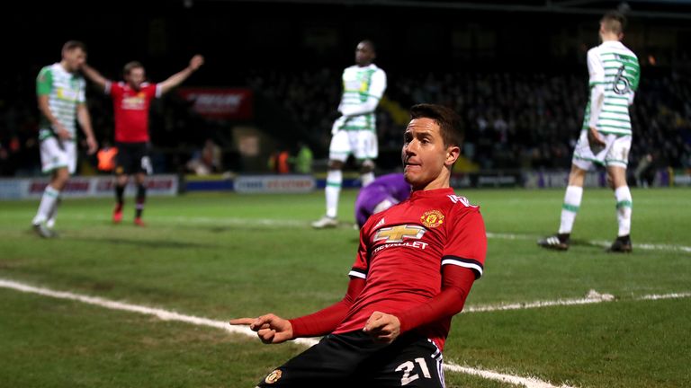 Ander Herrera celebrates scoring his side's second goal, assisted by Sanchez