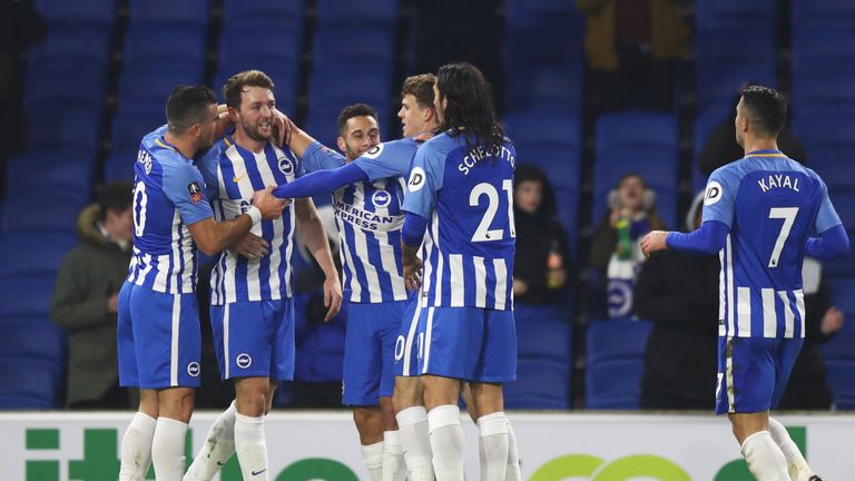 Dale Stephens is congratulated after scoring Brighton's first goal against Palace