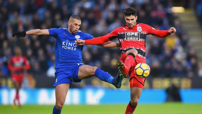 Islam Slimani challenges Christopher Schindler during the Premier League match