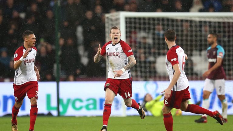 James McClean celebrates after scoring the opening goal at the London Stadium