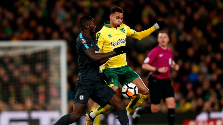 Josh Murphy (R) tangles with Antonio Rudiger