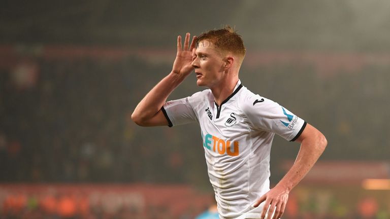 Sam Clucas celebrated his two goals against Arsenal with a 'spy' symbol