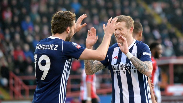 Rodriguez (left) celebrates scoring West Brom's second goal at Exeter
