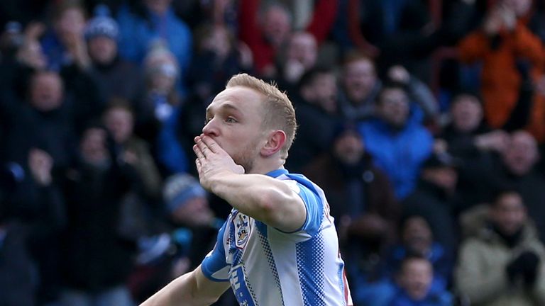Alex Pritchard celebrates after scoring his first-ever Premier League goal for Huddersfield