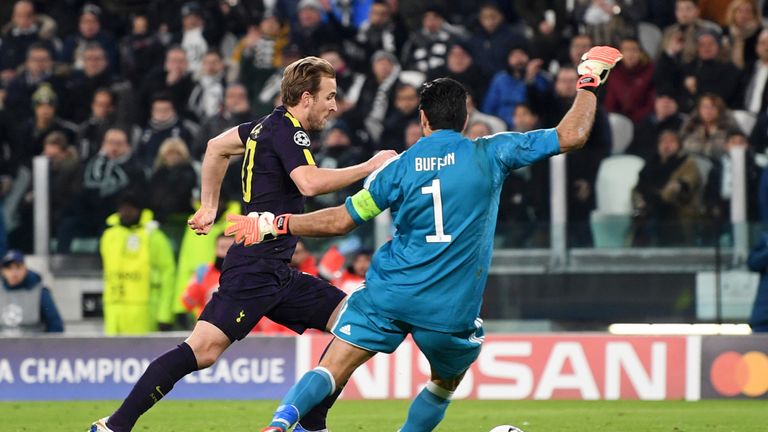 Kane rounds Gianluigi Buffon before scoring Tottenham's first goal