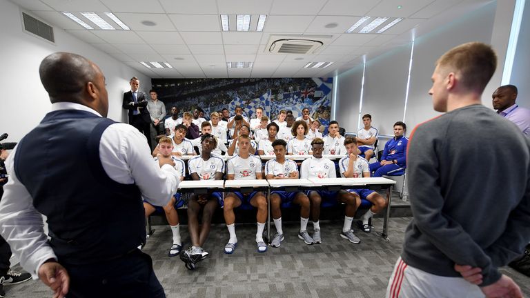 Kick It Out's Troy Townsend and WONDERKID director Rhys Chapman discuss the film with the Chelsea players at Cobham