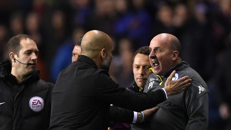 Pep Guardiola and Paul Cook clashed on the touchline following Delph's dismissal