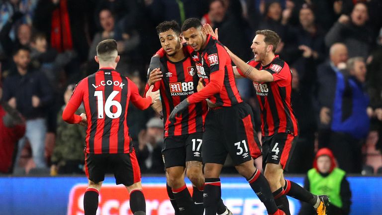 Joshua King celebrates scoring his side's first goal with team-mates
