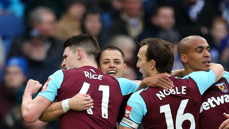 West Ham United's Javier Hernandez celebrates scoring their equaliser at the AMEX Stadium