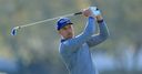 Stenson stays top as Tiger struggles