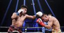 Garcia wins historic fourth world title