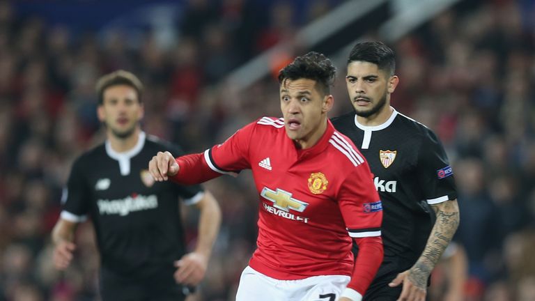 Alexis Sanchez in possession at Old Trafford in the first half
