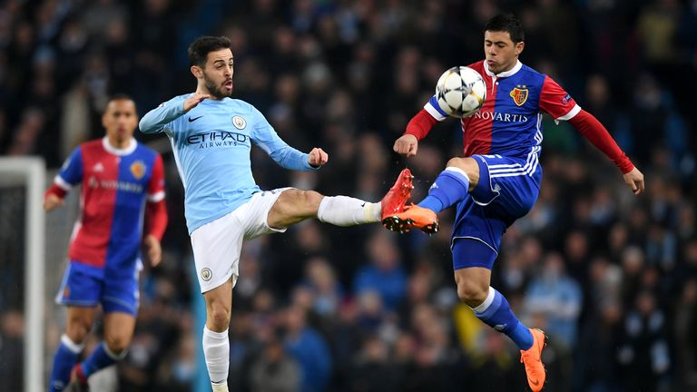 Bernardo Silva and Blas Riveros battle for the ball
