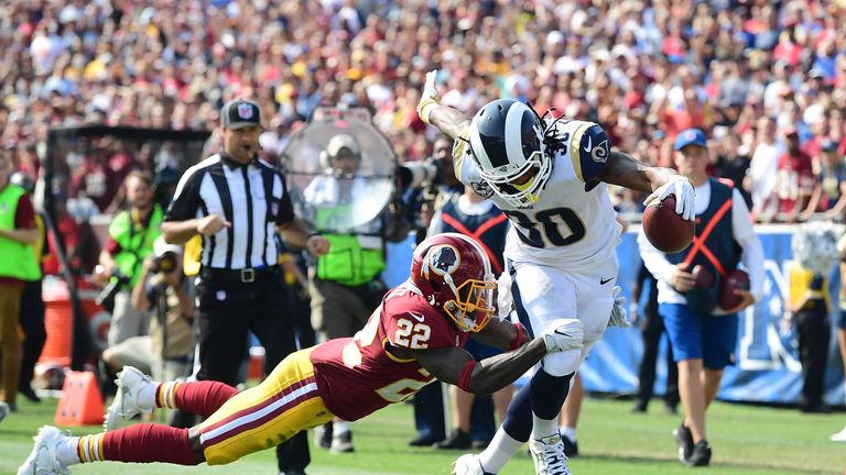 Deshazor Everett (#22) tackles Todd Gurley