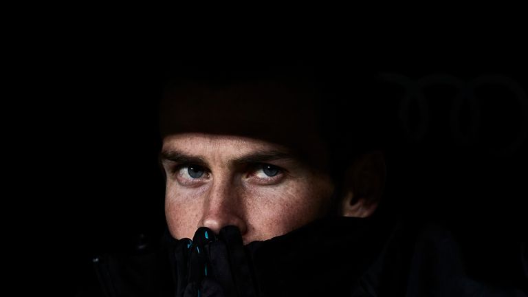 Gareth Bale looks on from the Real Madrid bench