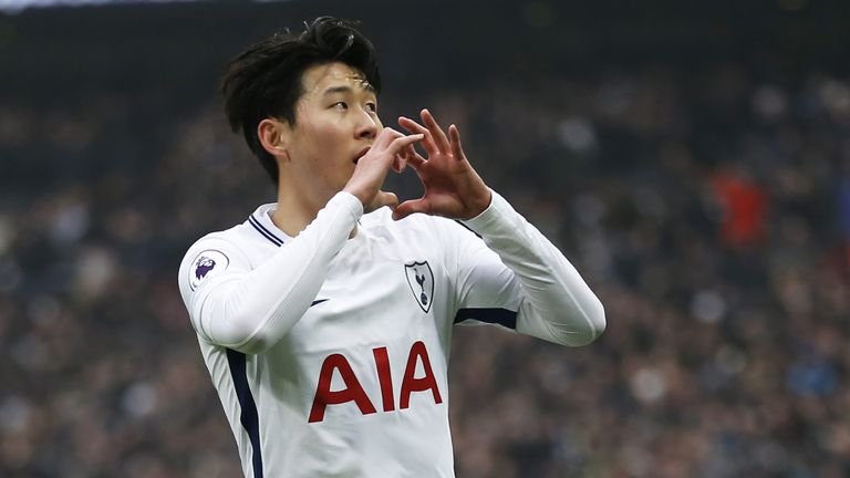 Heung-min Son celebrates scoring the opening goal
