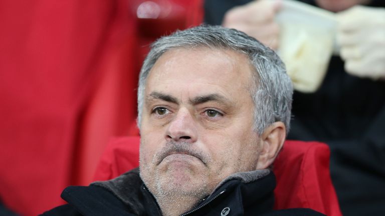 Mourinho looks on during a nightmare evening at Old Trafford