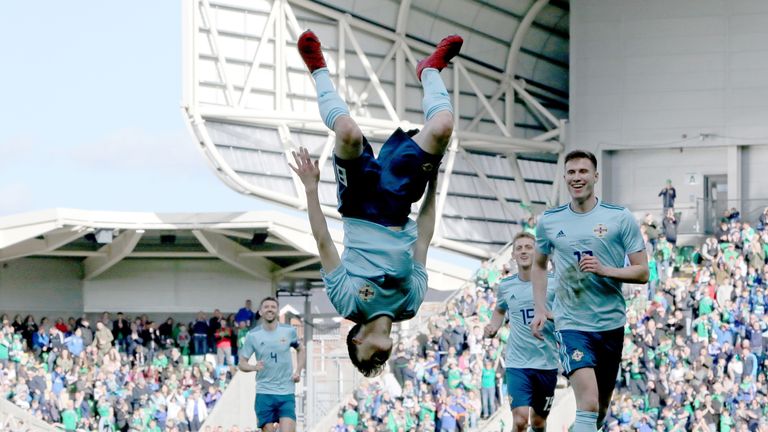 Paul Smyth celebrates after scoring Northern Ireland's winner against South Korea