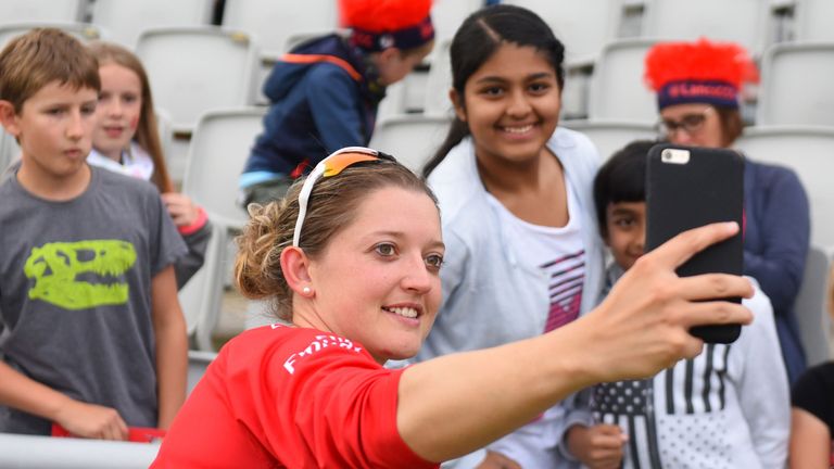 Taylor, of Lancashire Thunder, posing with fans during the 2017 Kia Super League