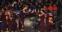 Messi hat-trick seals Barca title