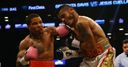Davis finishes Cuellar in three