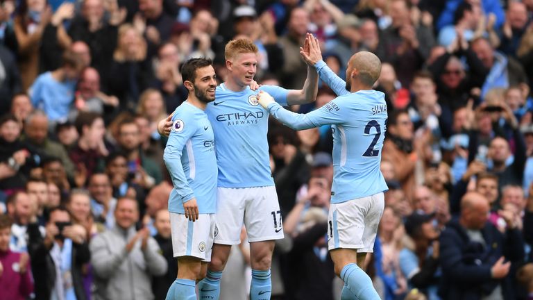 Kevin De Bruyne is congratulated after his sensational strike put Man City 3-0 ahead