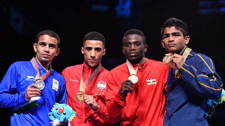 Yafai (second from left) poses with fellow medalists Amit, Juma Miiro and Thiwanka Ranasinghe