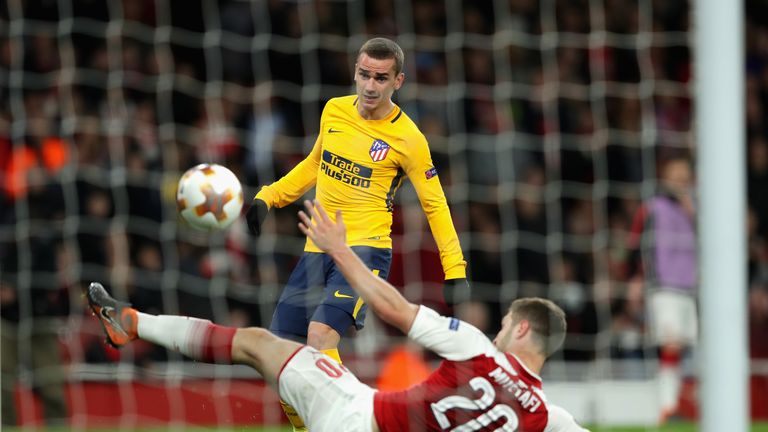 Antoine Griezmann lifts the ball over Shkodran Mustafi to equalise in the first leg